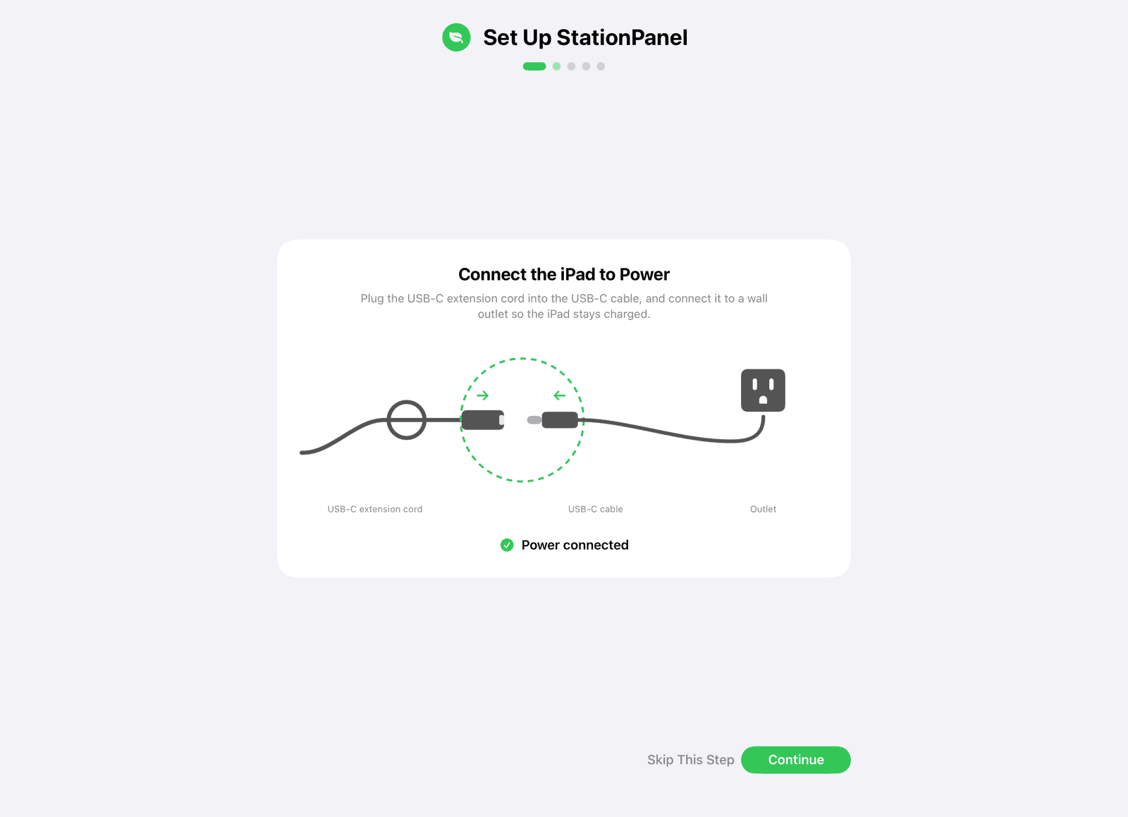 Setup step one on the iPad: “Connect the iPad to Power”, with a diagram of the cable and outlet and a “Power connected” check.